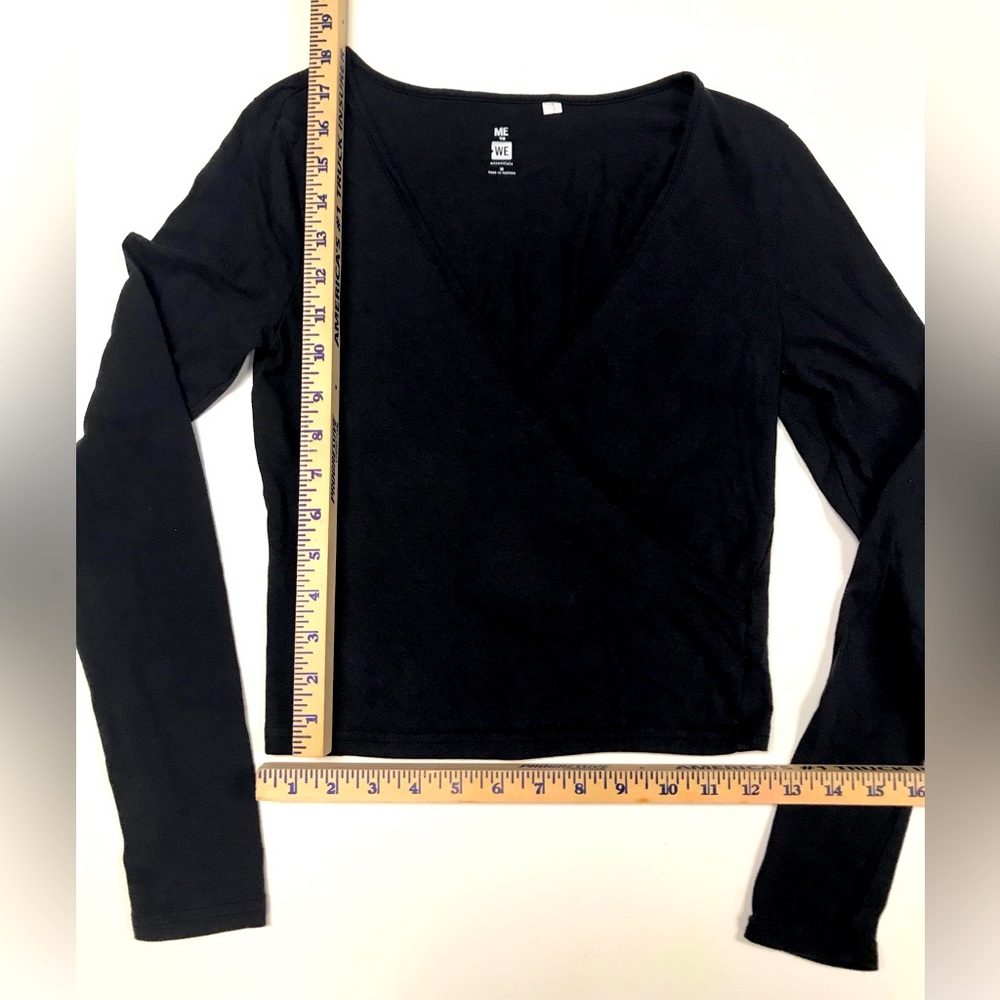 “ME to WE essentials” black top, size women’s M.